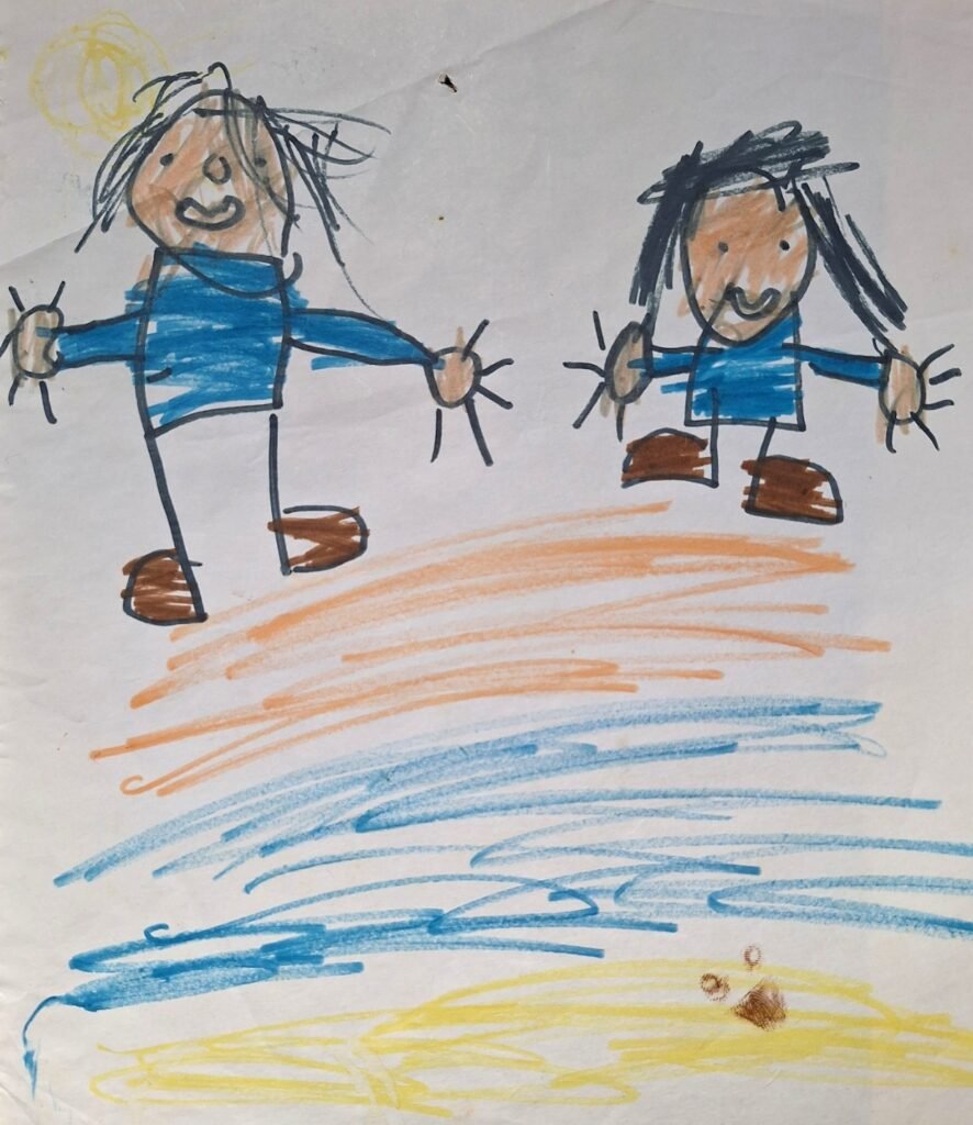Felt pen drawing by one of my children - block figures in blue and orange, with a sunshine